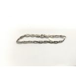 A 9ct white gold diamond set bracelet, approx 8.6g