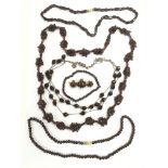 A collection of garnet jewellery comprising neckla