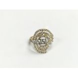 A 14ct gold multi stone set ring with Greek key de