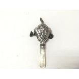 A silver hallmarked child's rattle 34.38g - NO RES