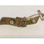 A 18 ct Edwardian brooch inset with diamonds 6.3 g