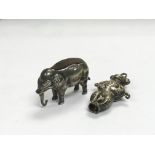 A silver pin cushion in the form of an elephant to