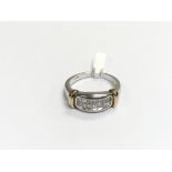 A 9ct white and yellow gold ring set with princess
