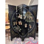 A 4 panel lacquered Chinese screen with applied st