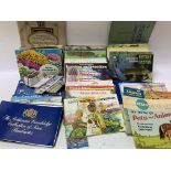 A large collection of tea card albums and cards inc cigarette cards.