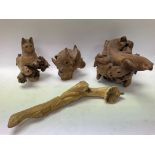 4 Root carvings in the form of a lizard, iguana, a