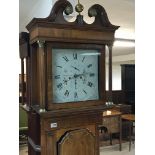 An Early 19th century inlaid Mahogany longcase clock with a white painted dial maker Wm Shakefhaft