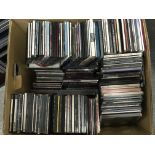 Two boxes of CDs by various artists including Adel