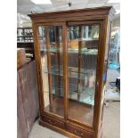 A modern design mirror backed display cabinet. 175