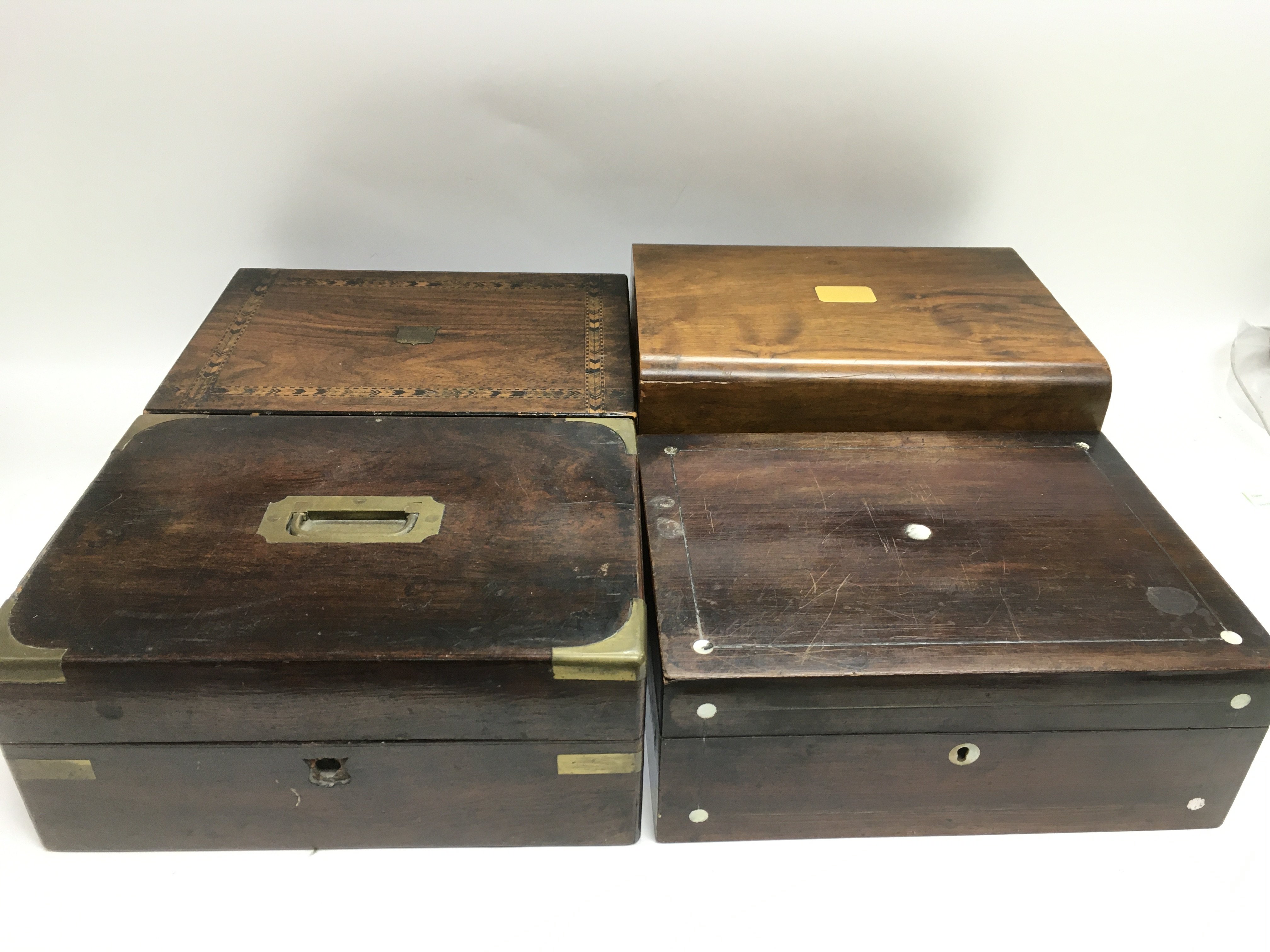 Four late Victorian boxes including a campaign typ