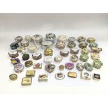 A collection of porcelain and enamel patch boxes.