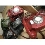 A collection of Bakelite telephones including emergency.