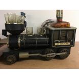 A decanter set in the form of a train .
