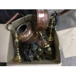 A collection of horse brasses, other brass items i