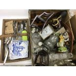 A box and a basket of various items comprising a six piece cruet set, cutlery, carriage clocks,