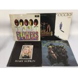 Twelve LPs by various artists including The Rollin