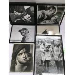 Six framed vintage movie prints.
