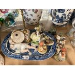 A collection of ceramics including Hummel figures,