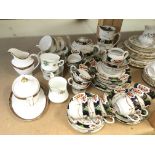 A decorative antique tea set plus other teaware.