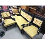 Three piece suite consisting of two arm chairs and