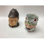 19th century porcelain Bacchus head jug and a toba