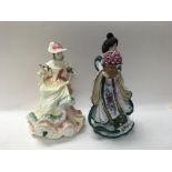 Two large porcelain lady figures