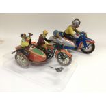 Two reproduction tin plate clockwork motorbikes an