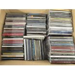 A box of CDs comprising mainly singles and some li