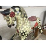 A Edwardian dapple grey rocking horse on pine stan