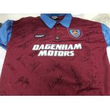 A multi signed West Ham Utd shirt.