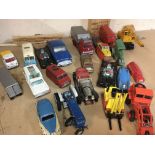 A box containing a collection of play worn cars in