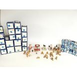 A large collection of 50+ colour box miniature teddy bear figures majority with boxes.