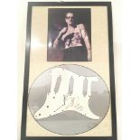 A Framed Signed Bono Guitar Plate.