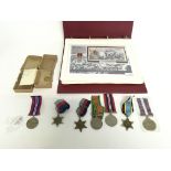A collection of reproduction military medals.