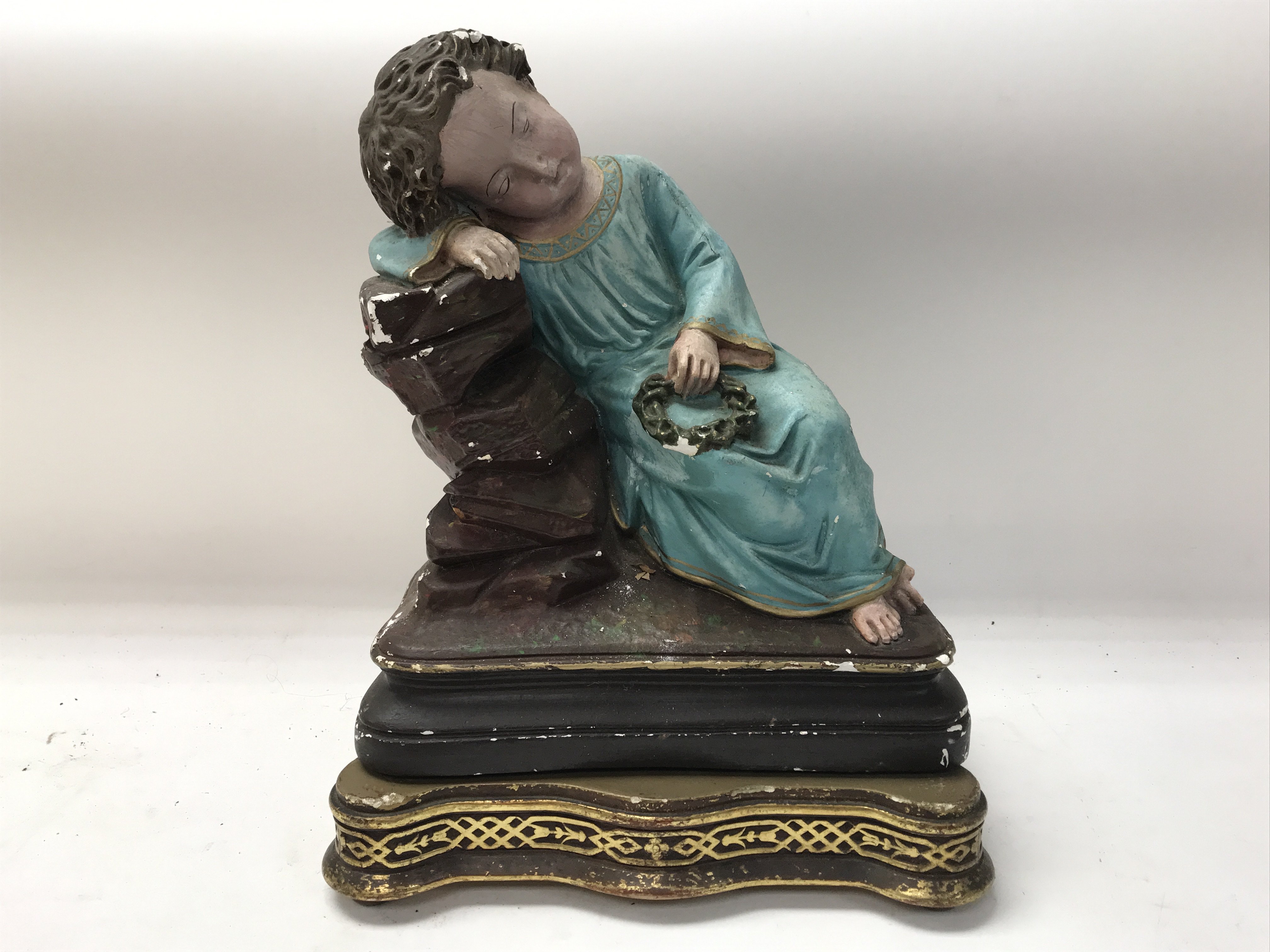 Infant Jesus statue with Crown of Thorns, needs restoration due to paint chips. Approximately 30cm