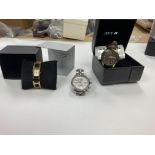 A ladies Calvin Klein watch with a mens Ingersoll chronograph watch and a mens AVI-8 watch in box.