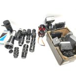 A collection of camera lenses and other related ca