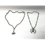 White metal necklaces, one with turquoise pendant