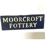 A Moorcroft Pottery cabinet display sign. Length 1