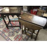 No Reserve - A carved oak occasional table with a