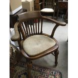 No Reserve - An oak open arm chair.