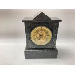 A slate mantle clock 30cm by 22cm approximately