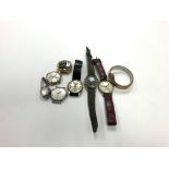 A collection of vintage mens and ladies watches and movements.