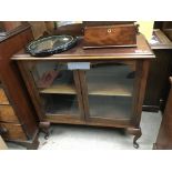 An Edwardian mahogany glazed 2 door cabinet. 91 x