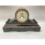 A slate mantle clock with Roman numeral face. 45 c