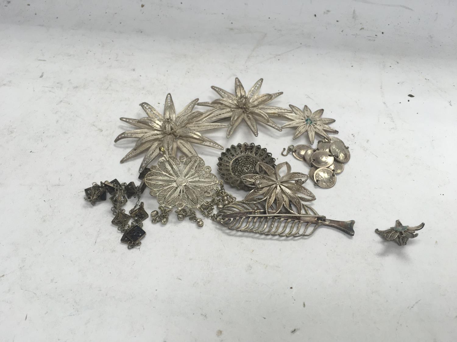 A collection of white metal Malaysian brooches a coin bracelet and other oddments - Image 2 of 2