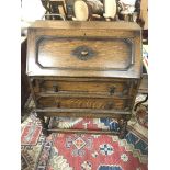 No Reserve - An oak bureau with a full front fitte