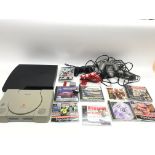 A PlayStation and a PlayStation 3 with various gam