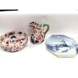 A collection of ceramics items including a large b