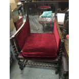 An antique library chair for restoration with barl